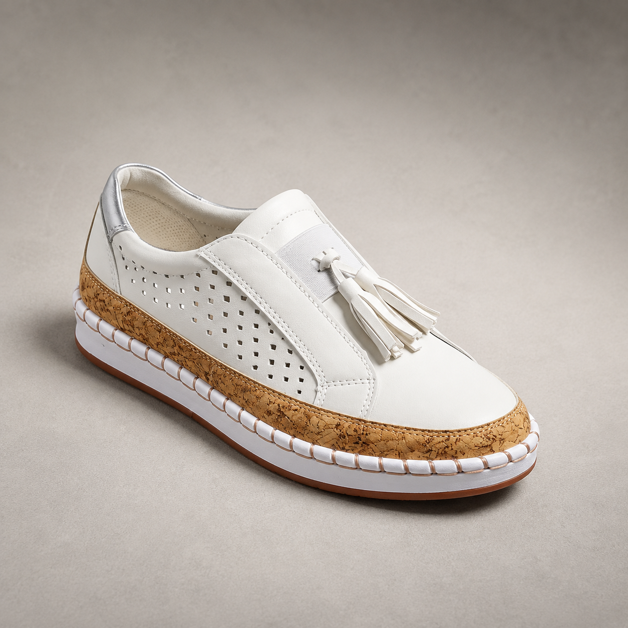 Volterra Perforated Tassel Slip On Sneaker